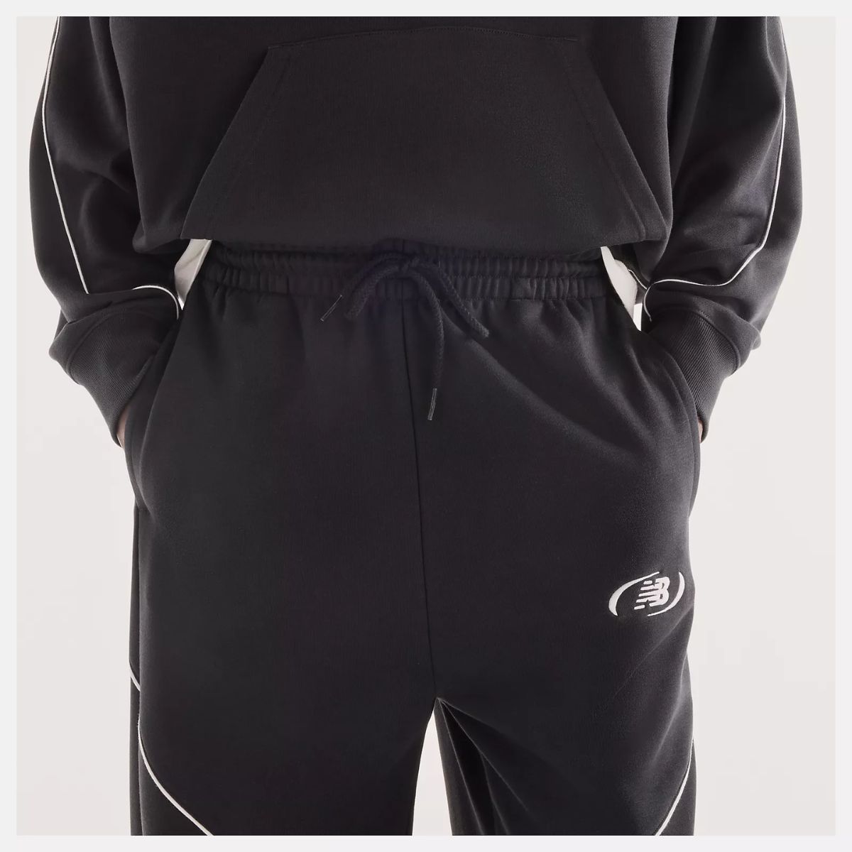 Calça New Balance Trackside French Terry