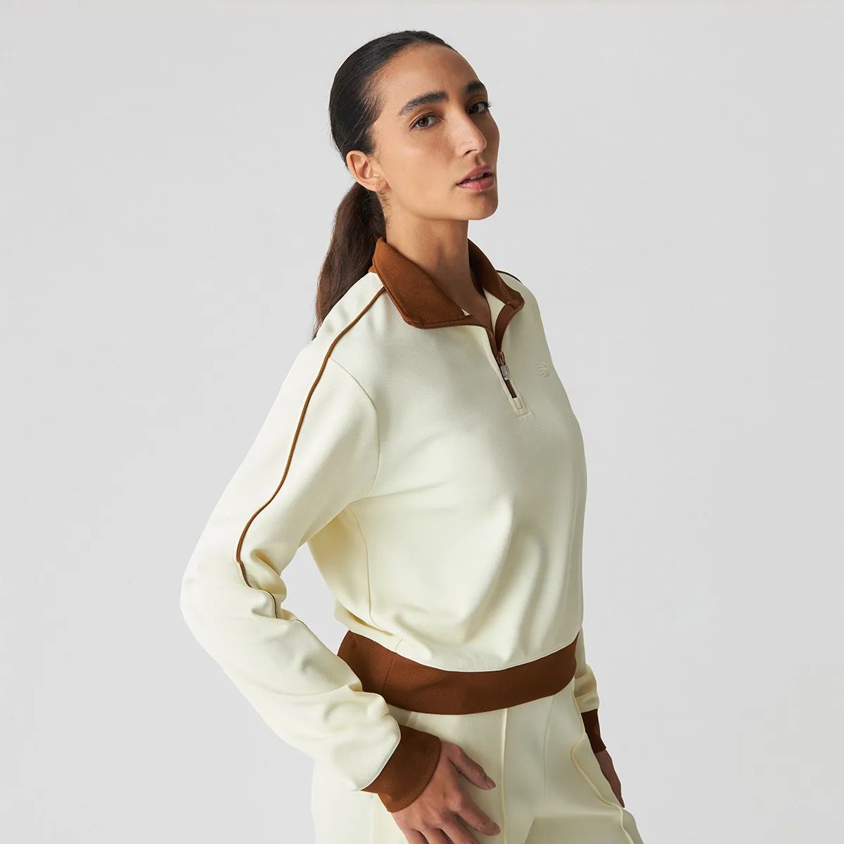 Casaco New Balance Sport Legacy Pique 14 Zip Feminino
